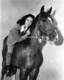 /album/kepgaleria-elisabeth-taylor-a-lovak-szerelmese/liz-taylor-on-her-horse-at-mgm-studios-copy-jpg/